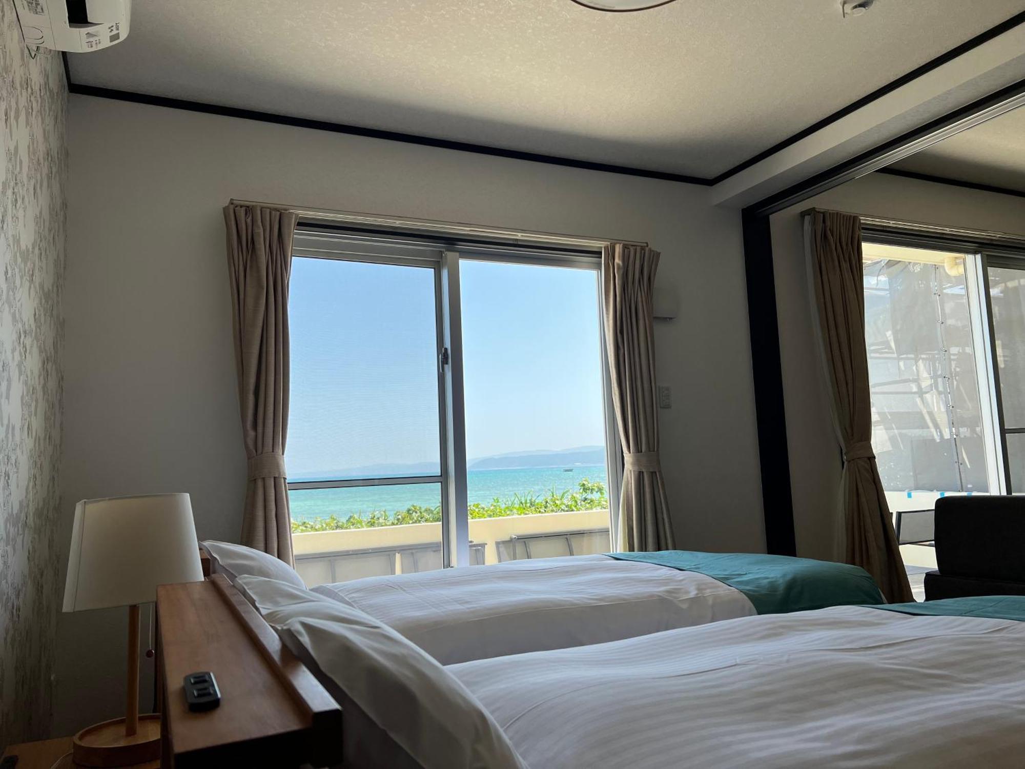 Apartamento Ocean Front Sumuide Nago Exterior foto